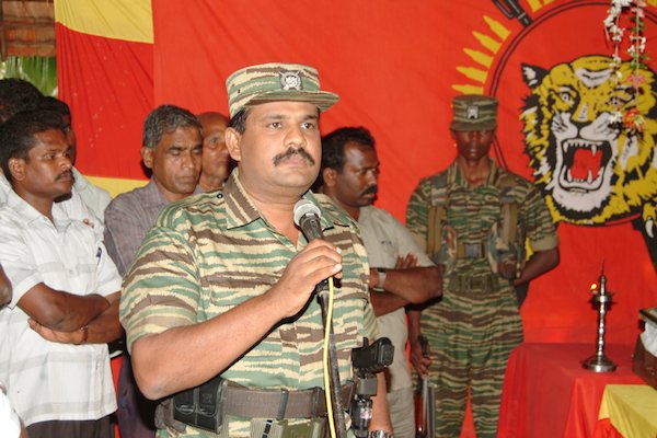 Col. Soosai, Liberation Tigers special commander of the Sea Tigers, addressing a gathering in Puthukkudiyiruppu
