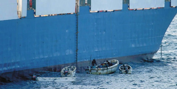 Somali pirates in small boats hijack the mv Faina, a Belize-flagged cargo ship owned and operated by Kaalbye Shipping Ukraine, on September 25, 2008.