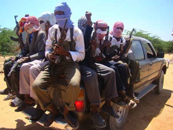 Somali Islamist militants of a coalition of four insurgent groups parade on the outskirts of the Somali capital Mogadishu, Feb. 2, 2009. The four rebel groups, the Dr. Omar Iman faction of the Union of Islamic Courts (UIC), Faruk Anole, Raskamboni, and the Islamic Front of Somalia, announced opposition to the newly-elected President of Somalia Shiekh Sharif Shiekh Ahmed in Mogadishu on Monday. (Xinhua/Abdurrahman Warsameh)