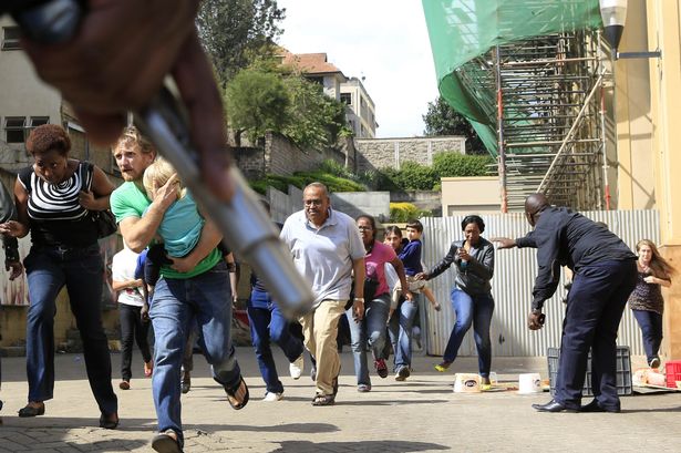 Shoppers-running-out-as-a-shooting-took-place-at-Westgate-shopping-mall-in-Nairobi-2290623