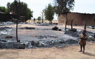 BHA-little-girl-and-a-security-operative-at-one-of-the-scenes-of-the-Kawuri-Borno-State-Boko-Haram-attack-360x225
