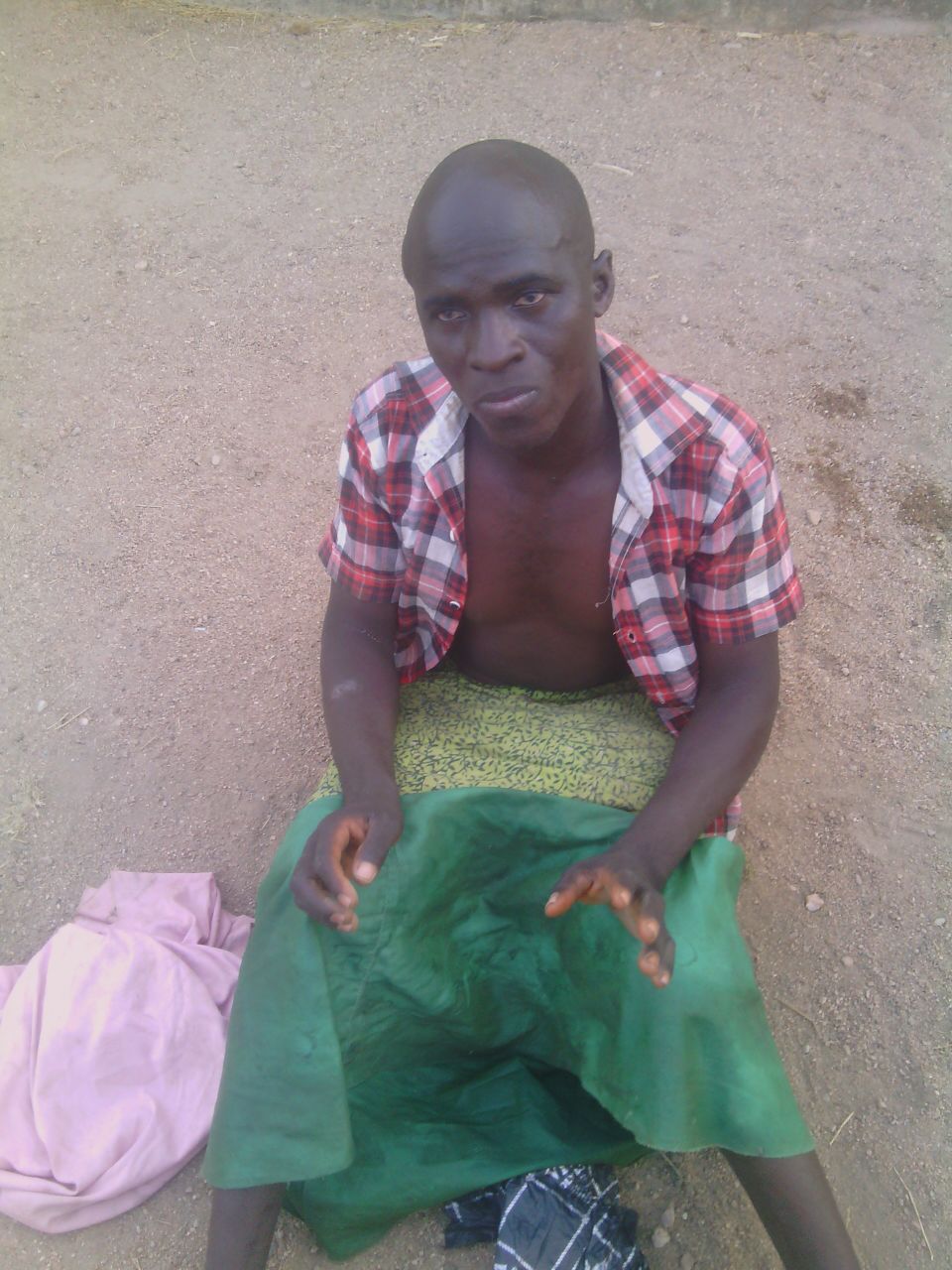 Male-terrorist-disguised-as-female-in-Hijab-nabbed-by-Nigerian-troops-as-he-made-for-market-in-Kwaya-Kusar-in-Borno-last-weekend-1