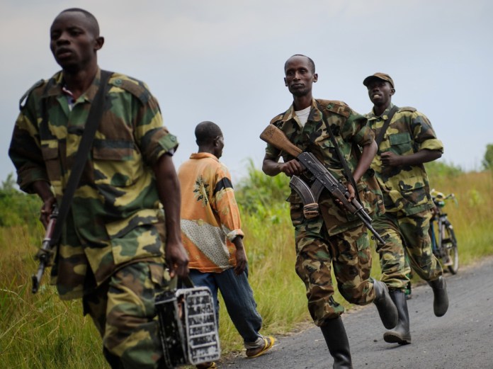Congo-rebels-from-the-group-known-as-M23-run-toward-the-town-of-Sake-in-the-eastern-part-of-the-country