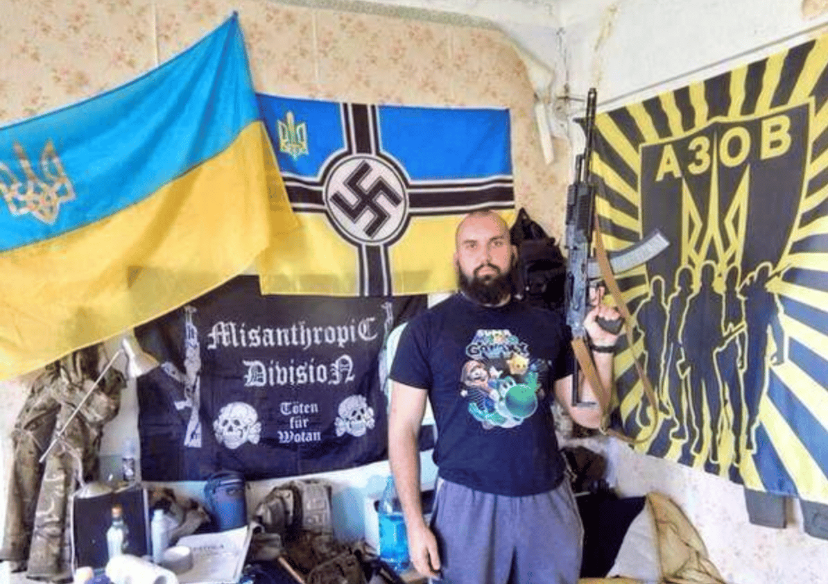 Selfie Photo of Ukrainian With “Misanthropic Division; Killing for Wotan” and Azov Battalion Flags Circulates in Acceleration Telegram Channels - 22 February 2022