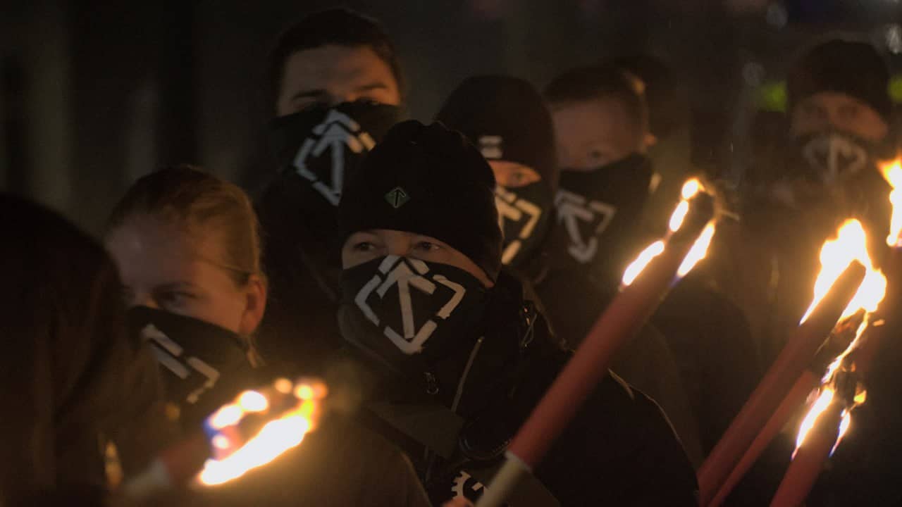 (Photos) Nordic Resistance Movement Elements March with Flags, Banners & Torches through Stockholm, Sweden - 18 February 2023