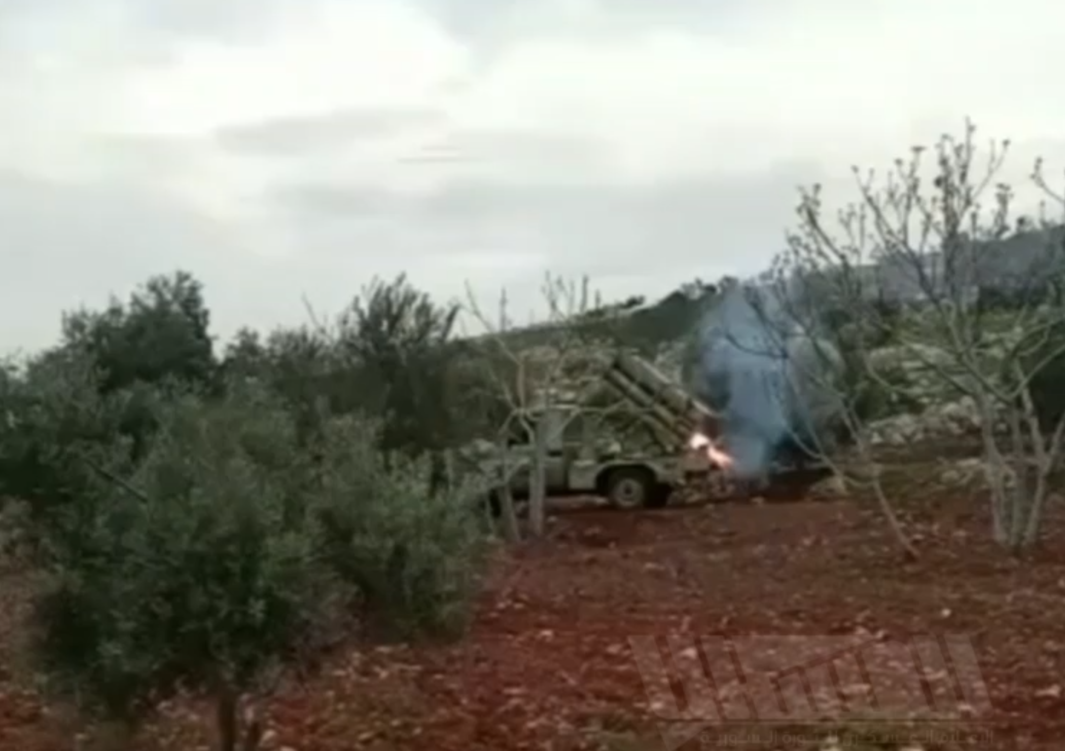 (Video) al-Fath al-Mubin Operations Room (Hayy'at Tahrir al-Sham / HTS) Targeted Syrian Army Forces with Rockets on al-Foug 46 Front, Western Aleppo, Syria - 1 April 2023
