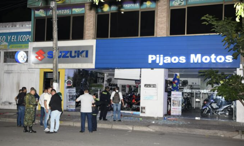Suspected Militants of the Central General Staff (EMC)/Revolutionary Amred Forces of Colombia (FARC) Throw an Improvised Explosive Device (IED) at a Motorbikes Dealership, Neiva, Huila, Colombia - 04 June 2024